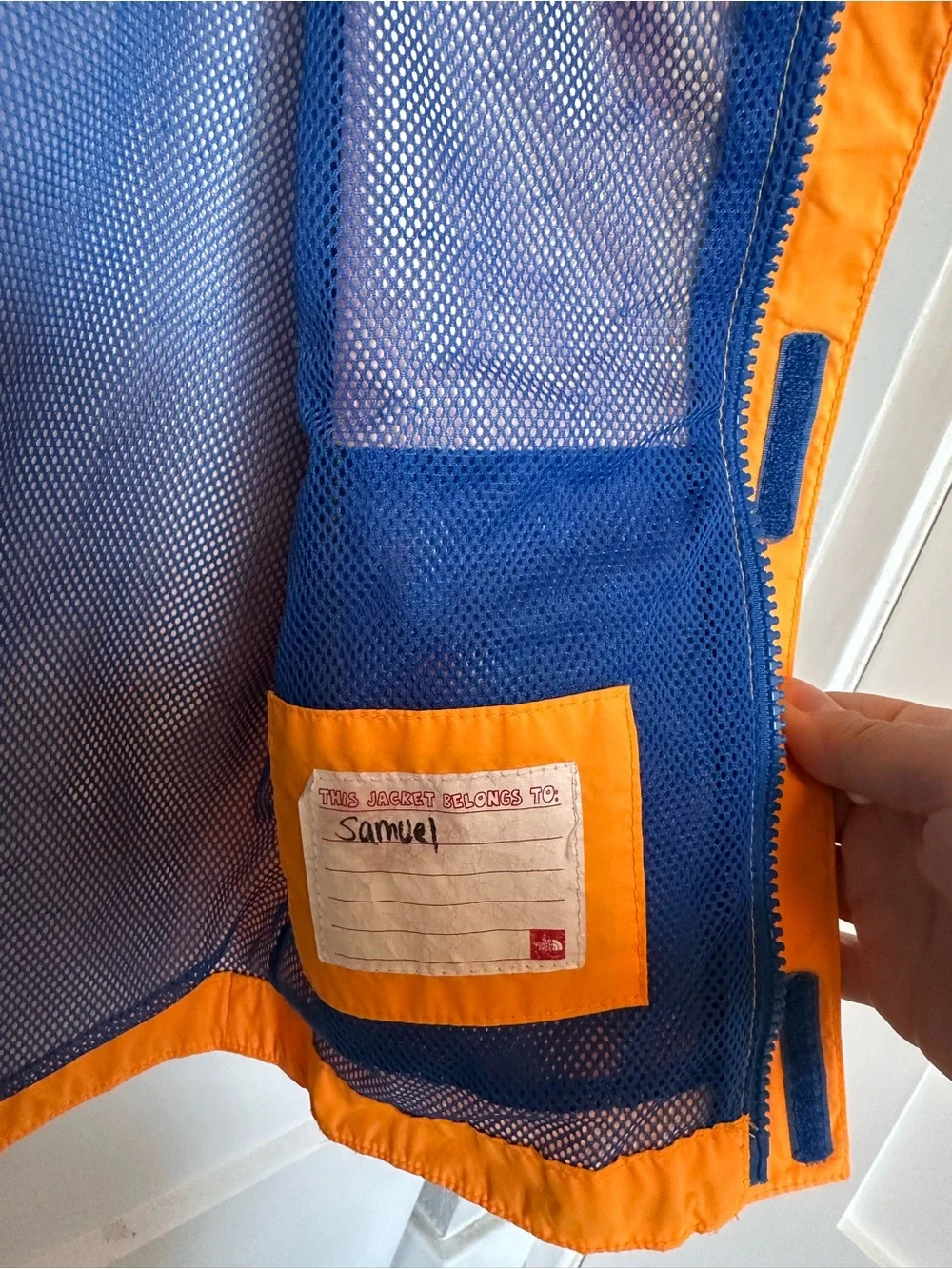 The North Face Kids Orange Hooded Rain Jacket